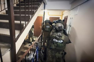 Funkcjonariusze w trakcie realizacji